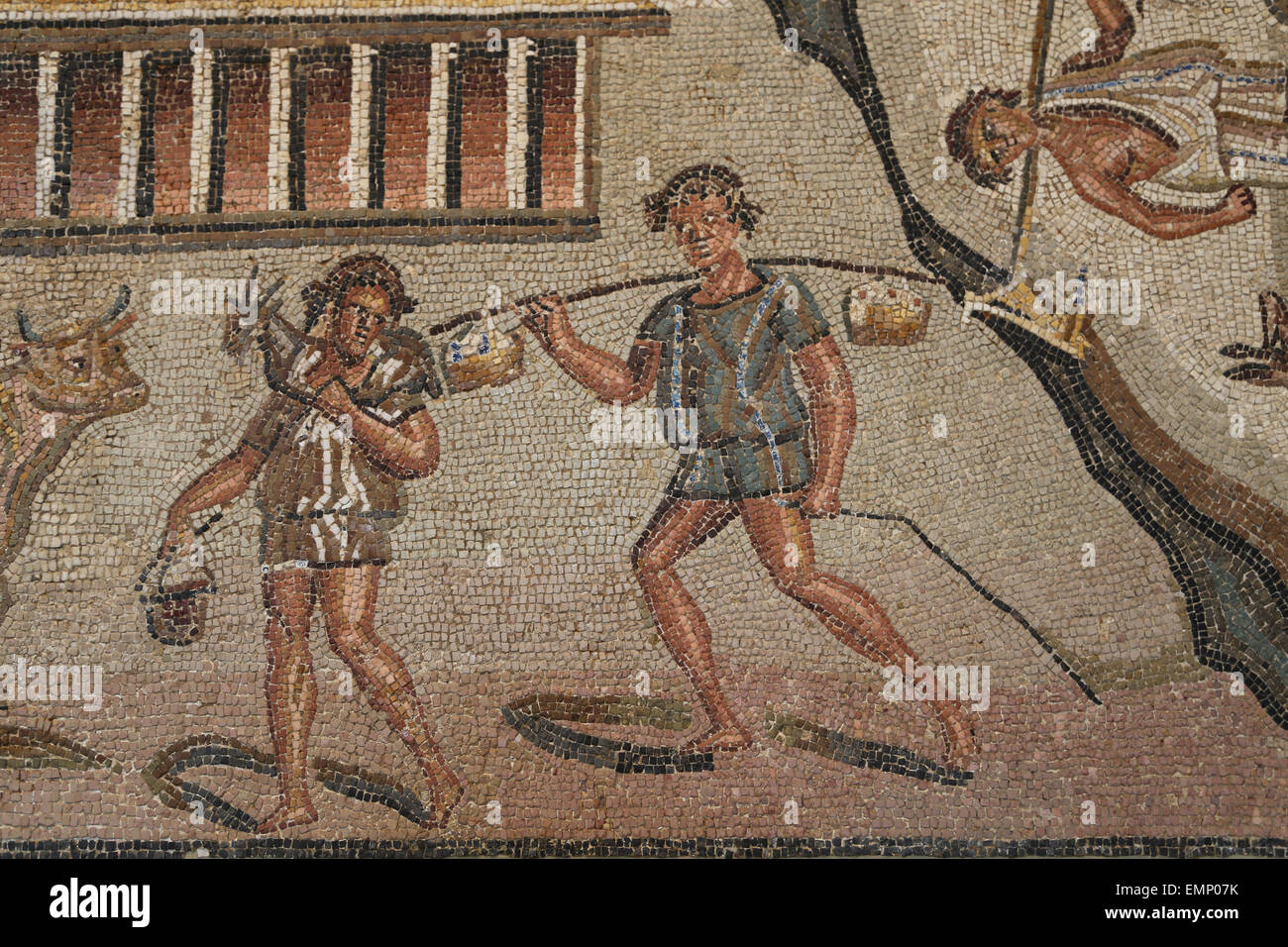 Roman mosaic with marine and rural scenes. Late Imperial, late 2nd-3rd C. AD. Detail. Workman with short tunic. Stock Photo