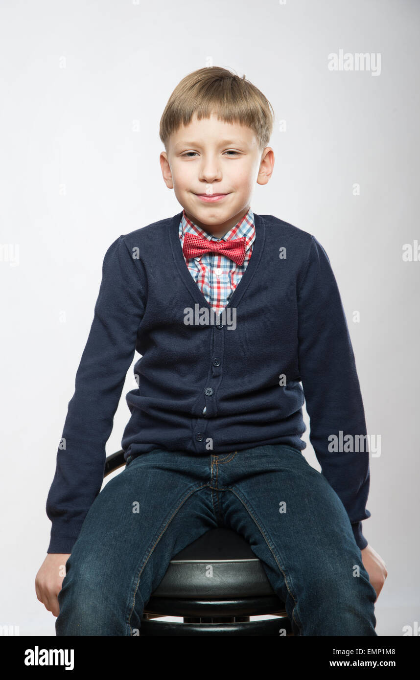 Close up portrait of young smiling cute boy on white background Stock ...