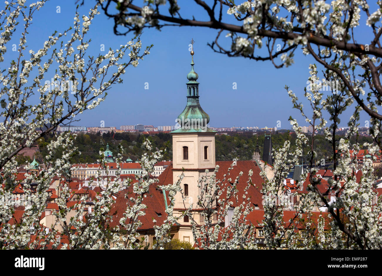 Church of Our Lady Victorious (Infant Jesus) view from blooming Petrin hill, Lesser Town, Prague, Czech Republic Stock Photo