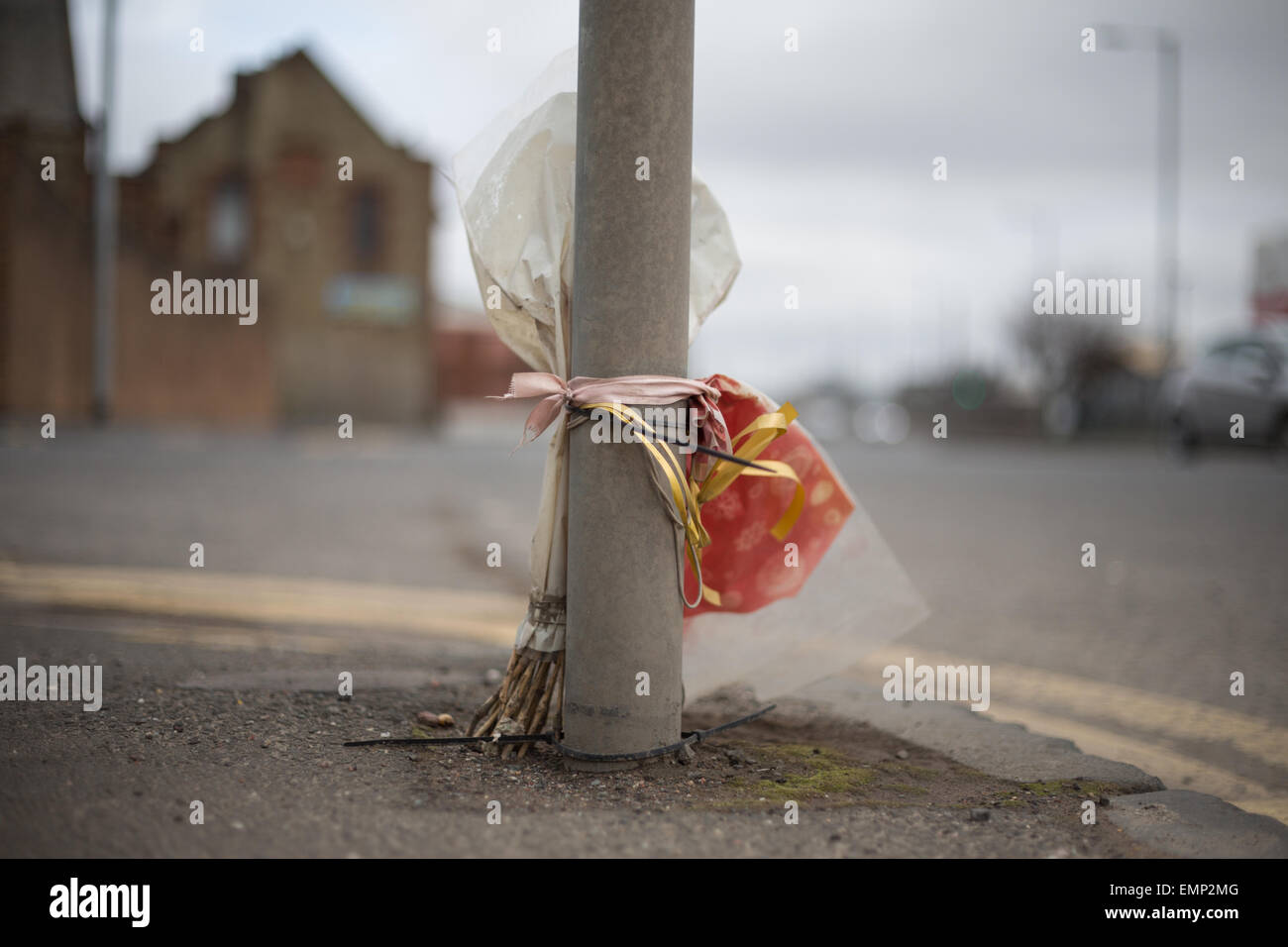 Flowers in tribute and memory to someone who has died in a public place