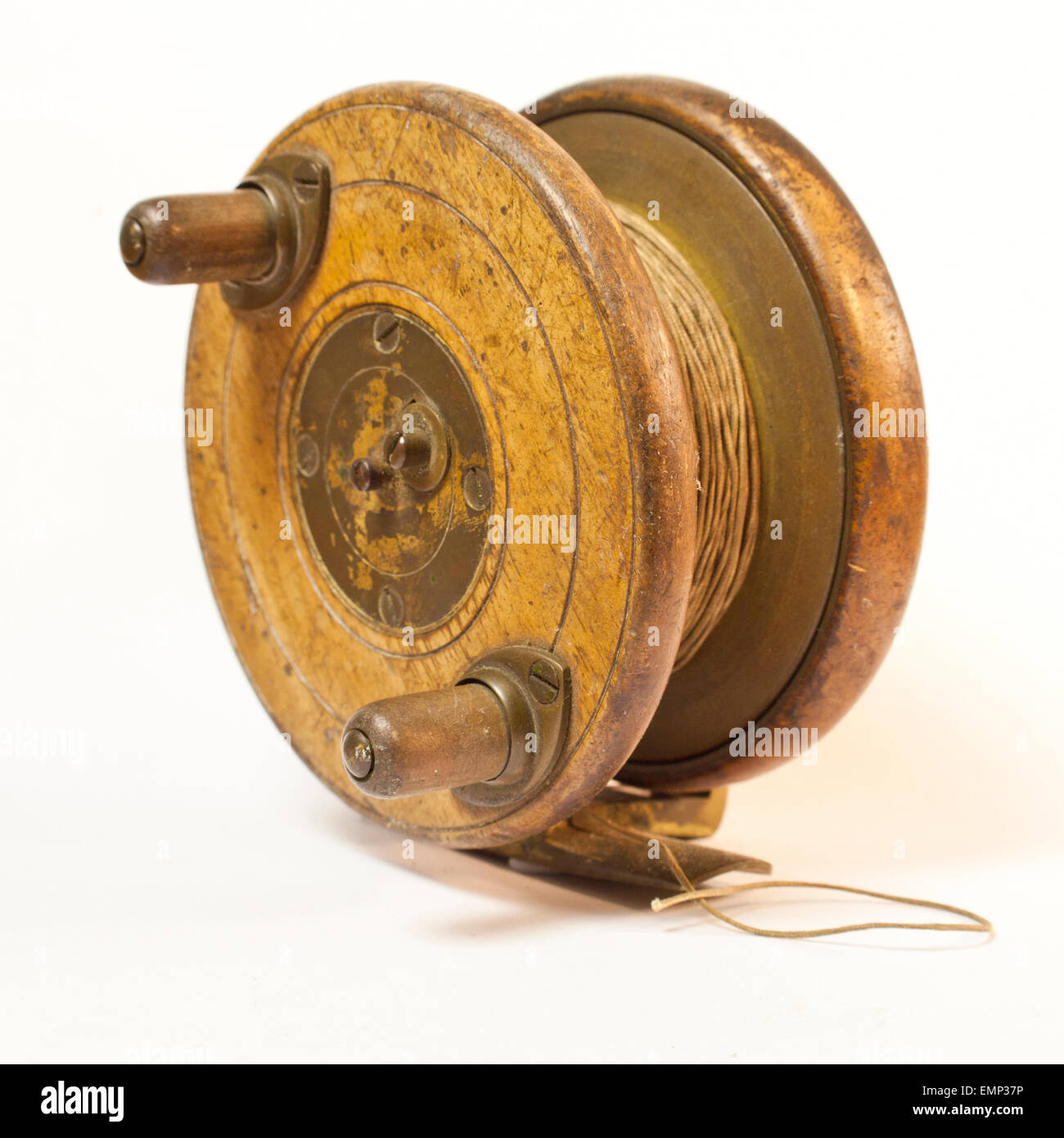 Antique wooden fly fishing reel Stock Photo