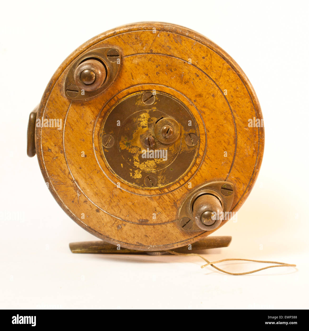 Antique wooden fly fishing reel Stock Photo