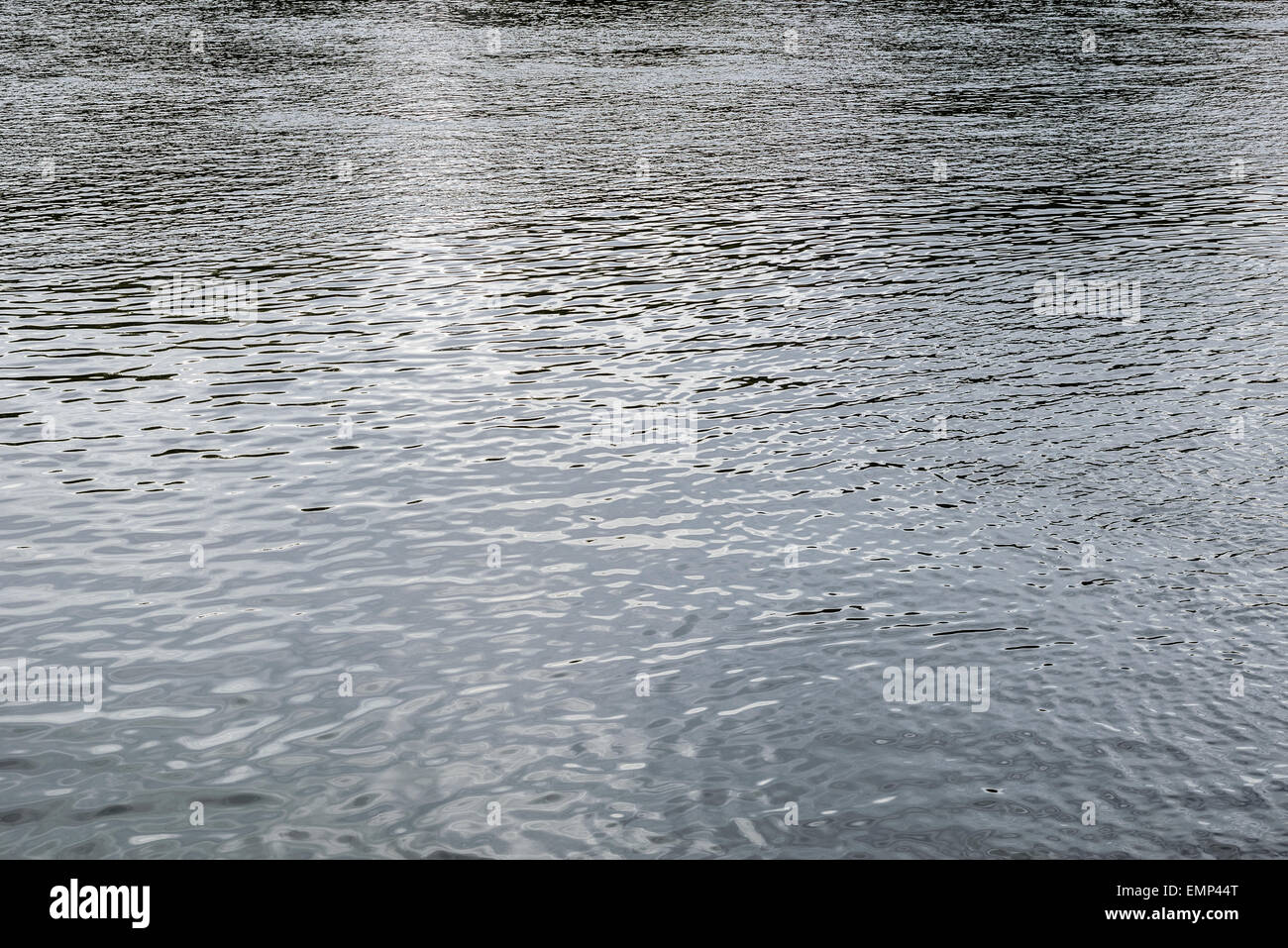 Water surface with reflections Stock Photo