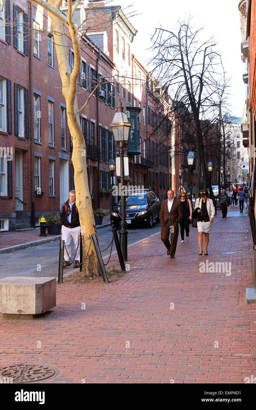 Boston Massachusetts Beacon Hill brick sidewalk with pedestrians. Stock Photo