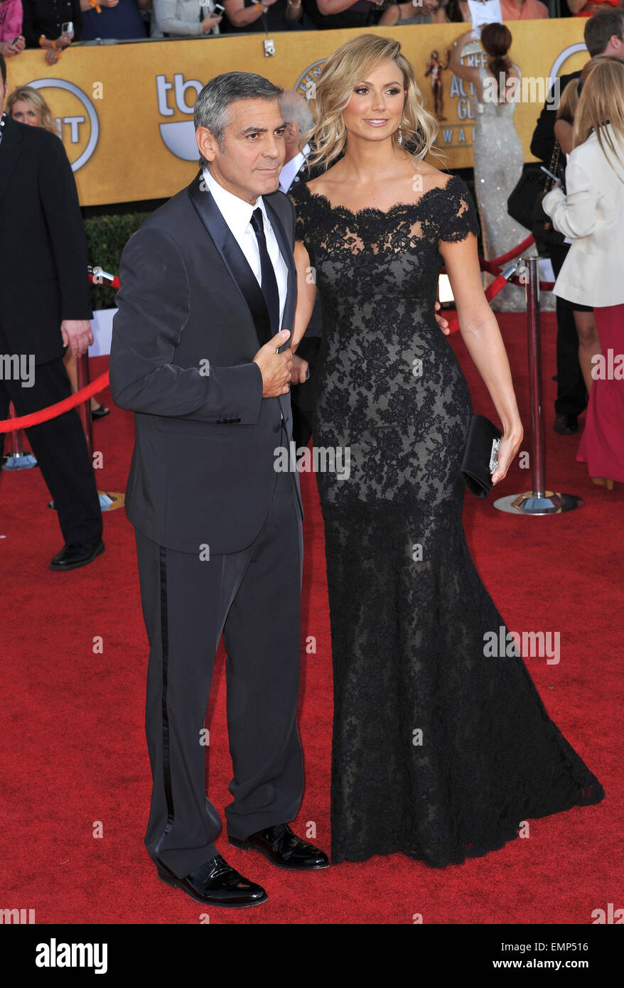 LOS ANGELES, CA - JANUARY 29, 2012: George Clooney & Stacy Keibler at the 17th Annual Screen Actors Guild Awards at the Shrine Auditorium, Los Angeles. January 29, 2012 Los Angeles, CA Stock Photo