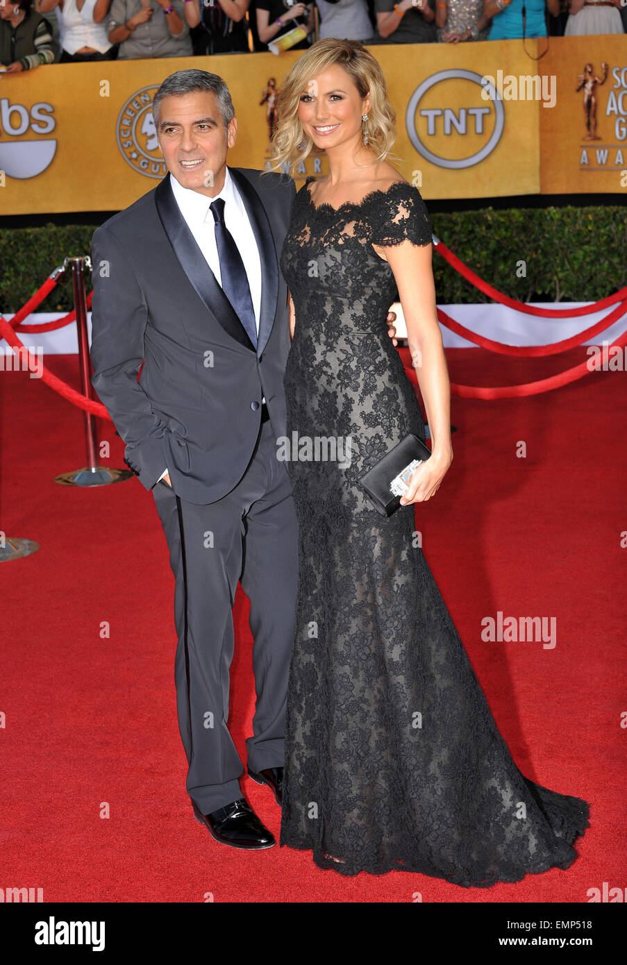 LOS ANGELES, CA - JANUARY 29, 2012: George Clooney & Stacy Keibler at the 17th Annual Screen Actors Guild Awards at the Shrine Auditorium, Los Angeles. January 29, 2012 Los Angeles, CA Stock Photo