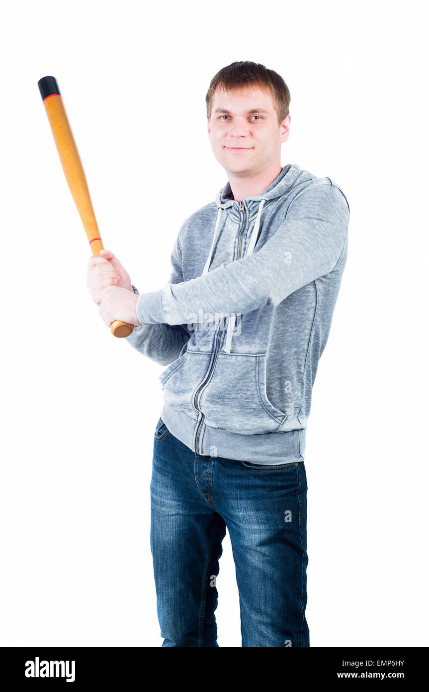 Young man posing with bat isolation white background Photo - Alamy