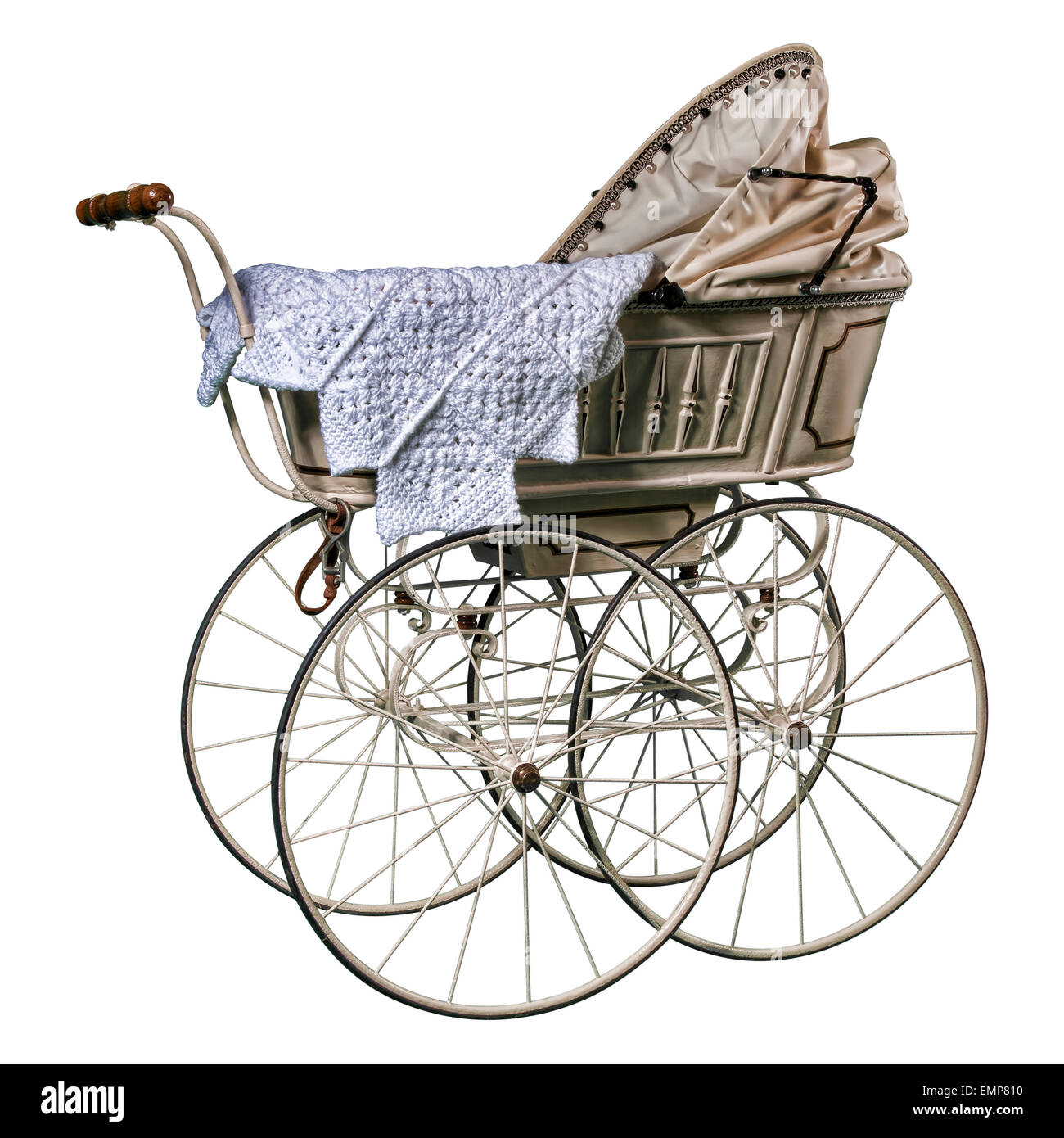 isolated edwardian pram in perfect condition, restored and against a while background Stock Photo