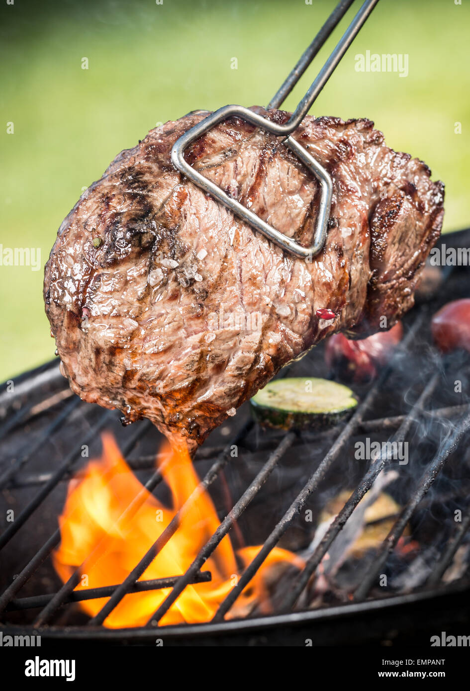 Beef steak on grill Stock Photo Alamy