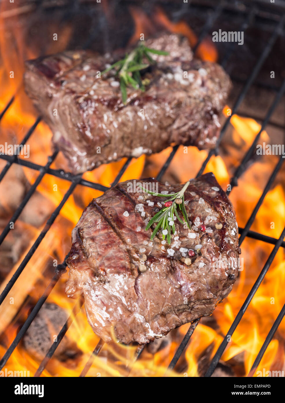 Beef steaks on grill Stock Photo Alamy