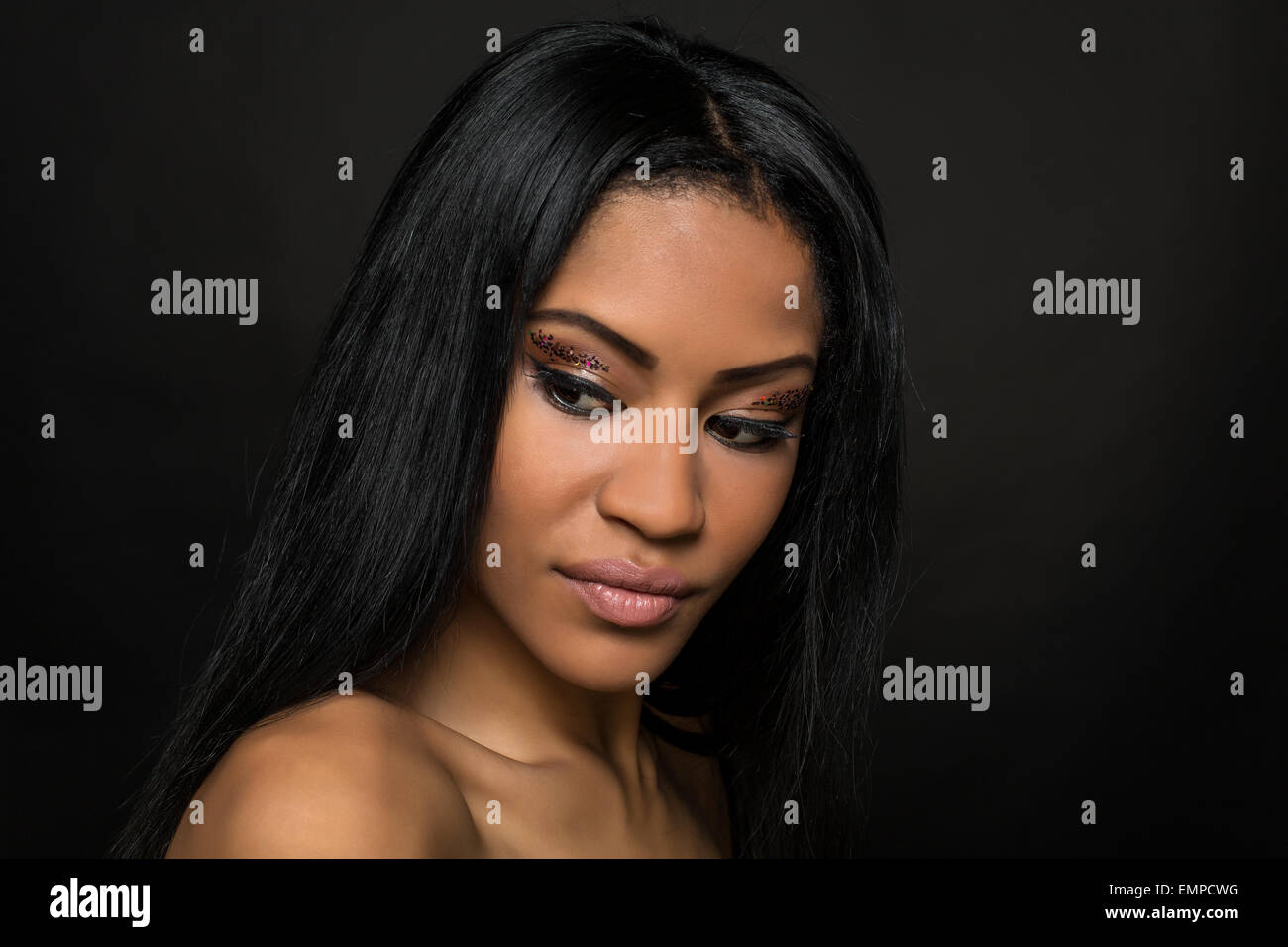Young woman with long black hair, beauty portrait Stock Photo
