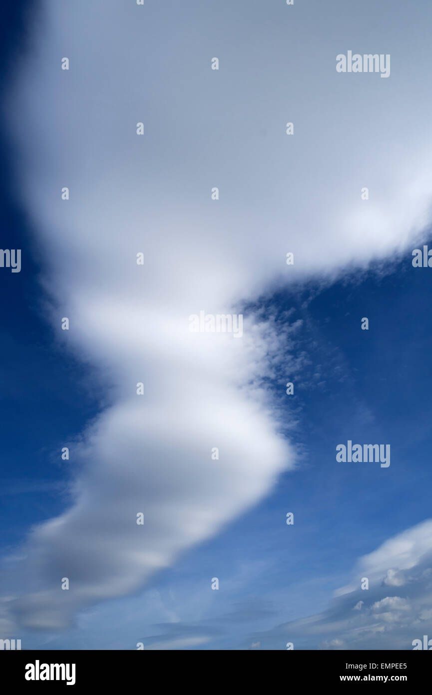 Cumulonimbus capillatus clouds in a blue sky Stock Photo