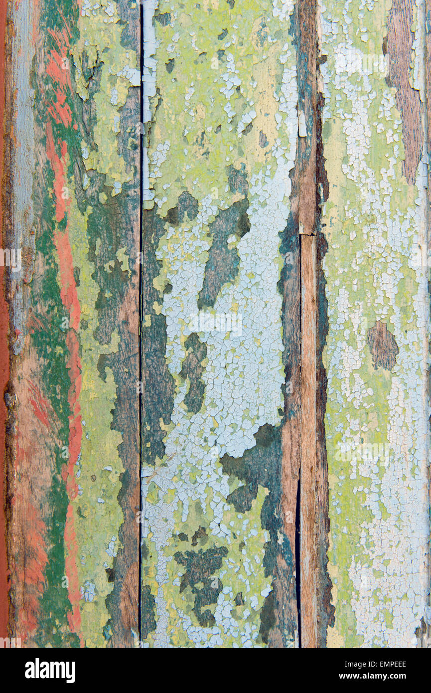 Planks with remnants of green paint flaking off, Kerala, India Stock Photo