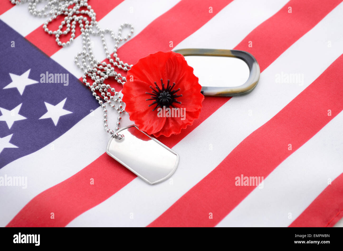 USA Memorial Day concept with dog tags and red remembrance poppy on
