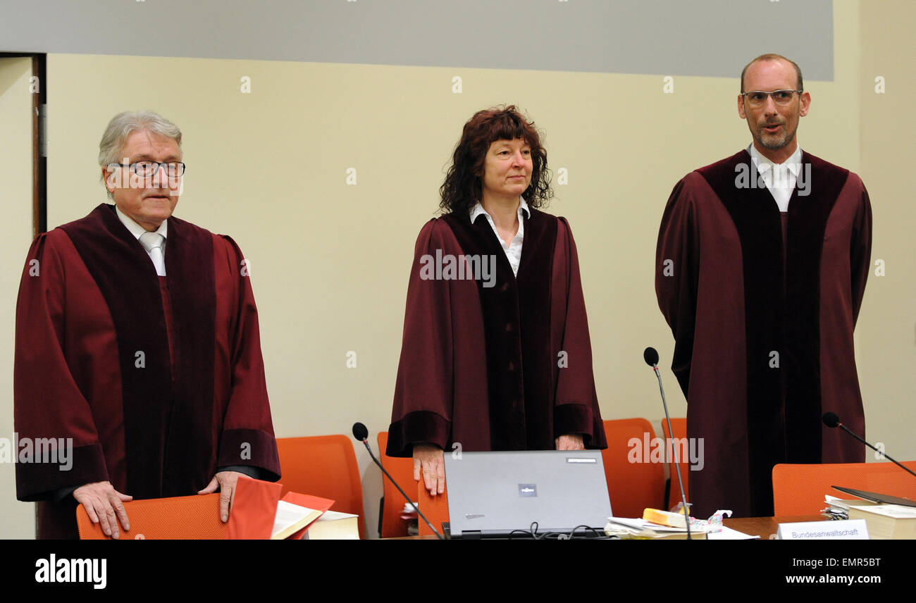 Munich, Germany. 23rd Apr, 2015. Federal public prosecutor Herbert Diemer (L-R) and chief prosecutors Anette Greger and Jochen Weingarten stand in the courtroom on the 200th day of trial in the Higher Regional Court in Munich, Germany, 23 April 2015. The trial of the National Socialist Underground (NSU) murders and terror attacks continues in the Higher Regional Court. Photo: ANDREAS GEBERT/dpa/Alamy Live News Stock Photo