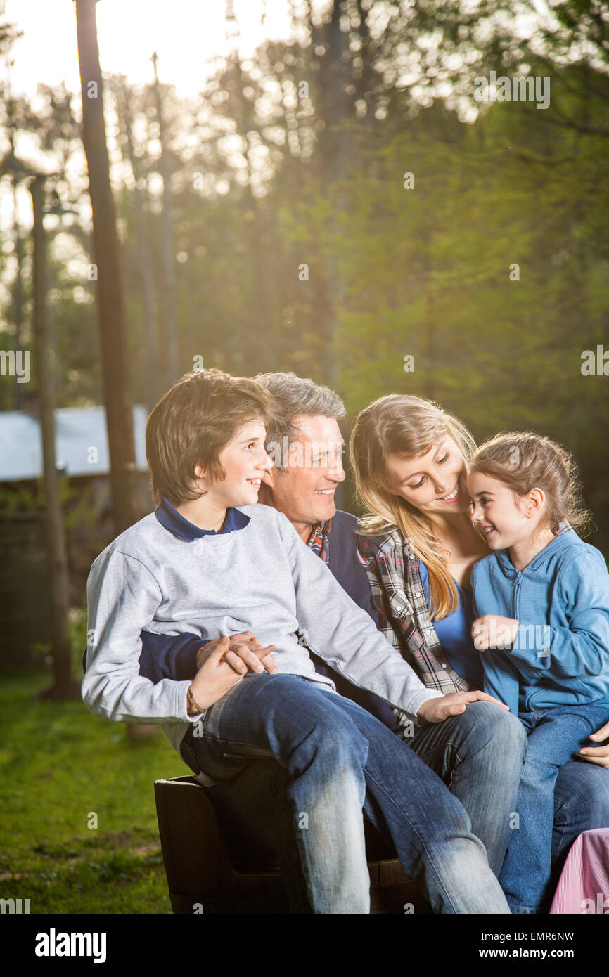 Family Spending Leisure Time At Campsite Stock Photo