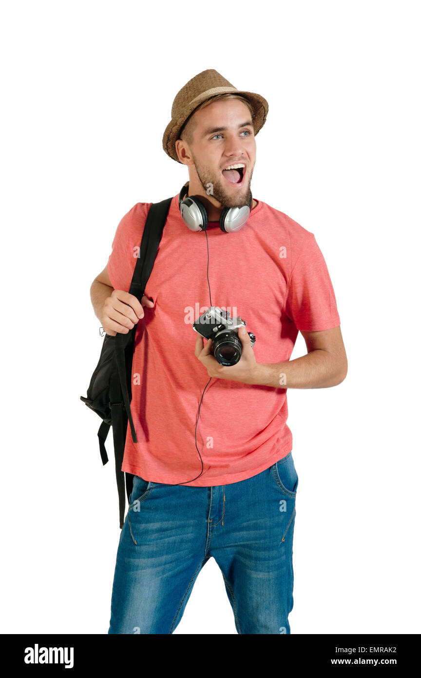 Young handsome traveler tourist with camera and backpack Stock Photo ...