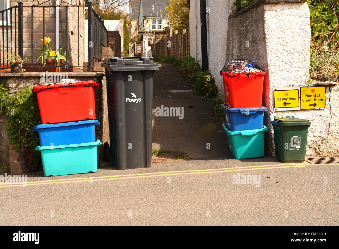 Household waste collection day with a variety of different coloured