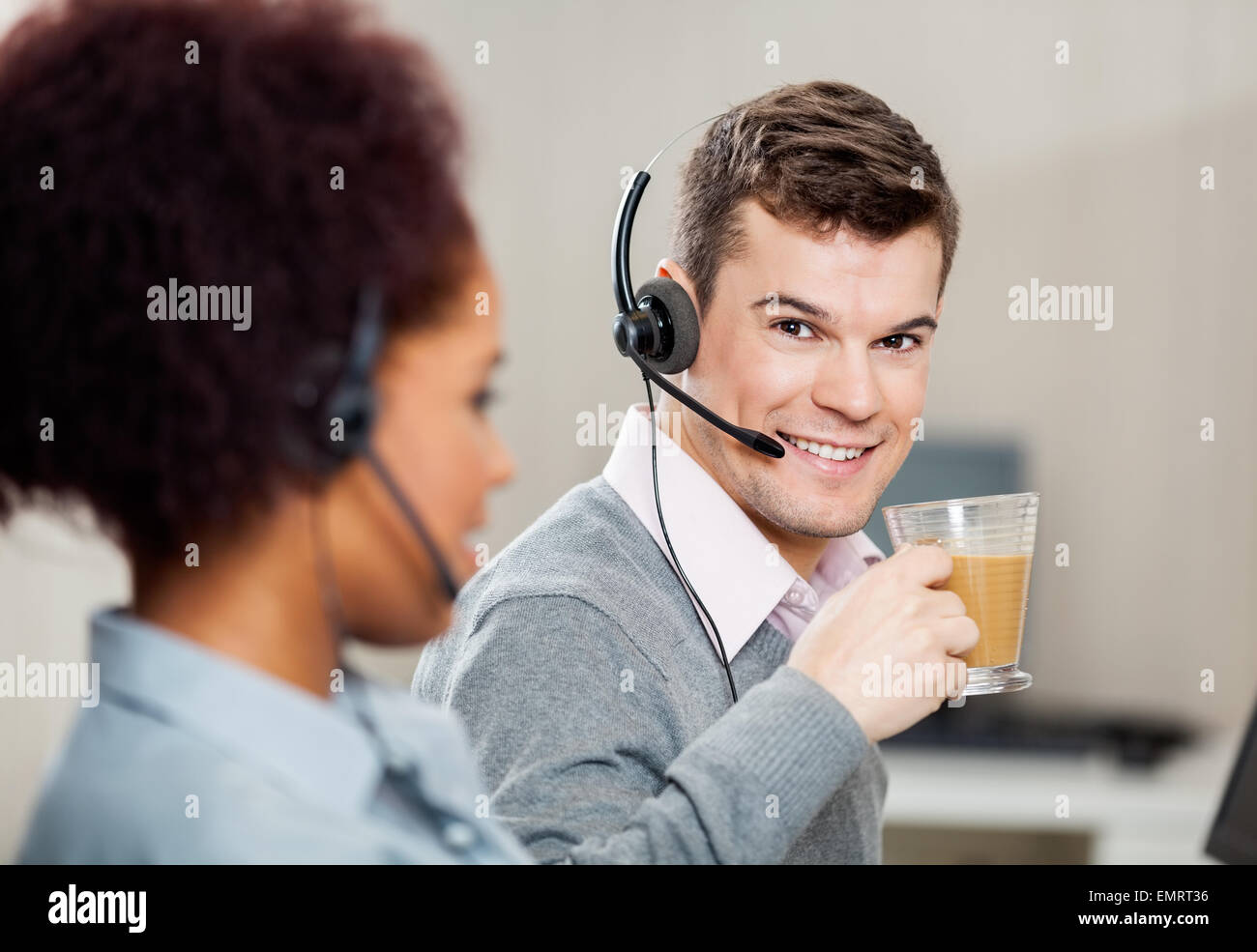 Customer Service Representative Having Tea In Office Stock Photo Alamy