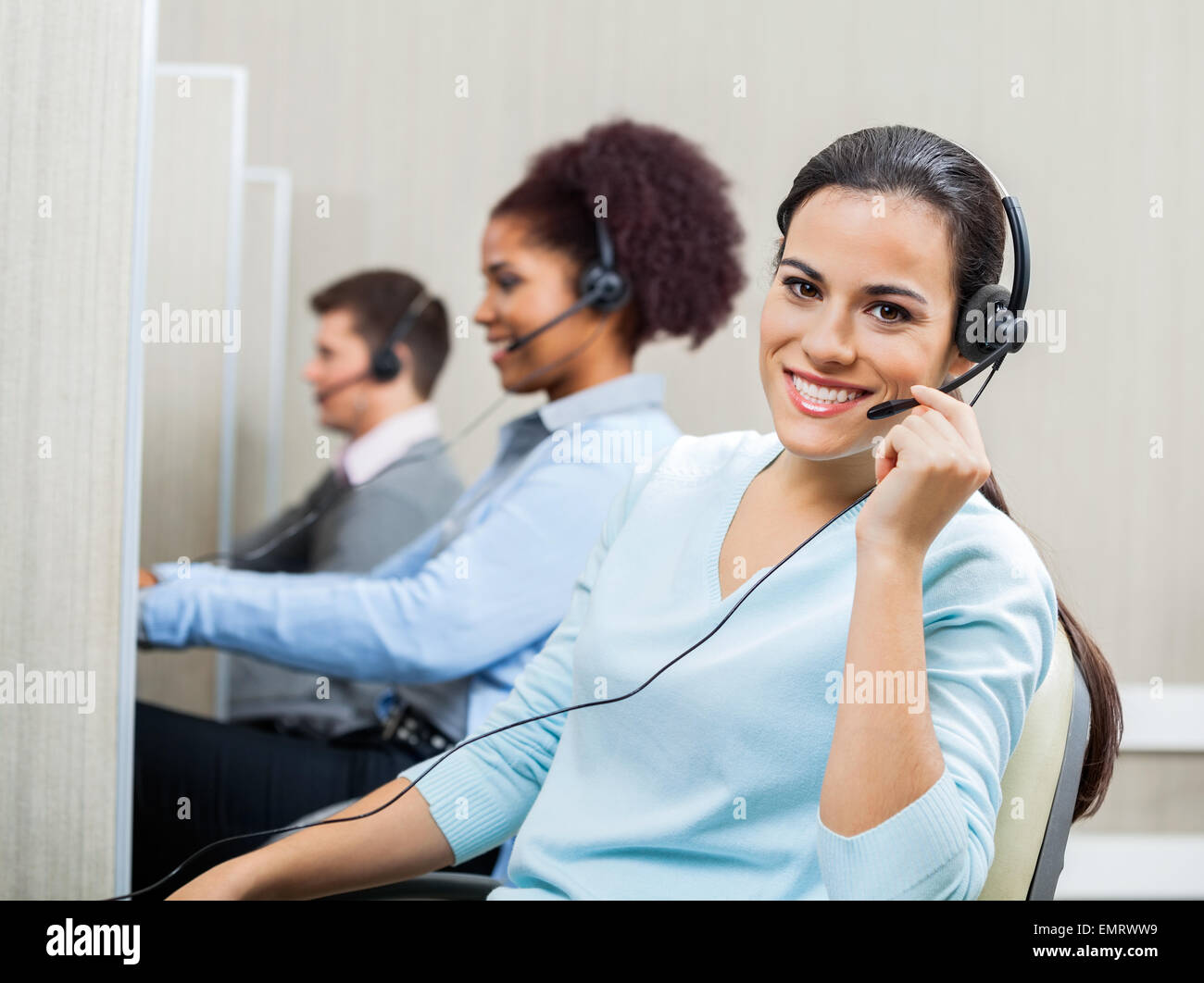 Portrait Of Smiling Female Customer Service Representative Weari Stock ...