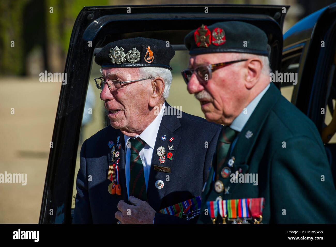 Rick Forest, 89 D-day, and Charles Jeffries, 93 D-day/Dessert Rat (Left) arrive by taxi - Second World War Veterans, and serving Guardsmen on Horse Guards Parade Ground to highlight Royal British Legion events on Victory in Europe (VE) Day. The Legion is also announcing that veterans and their carers will receive funding towards attending the event on the weekend of the 8-10th May.  Places will be available for a series of commemorative events over the weekend including on VE Day itself, Friday 8 May, when a Service of Remembrance will be held at The Cenotaph, with a national two minute silenc Stock Photo