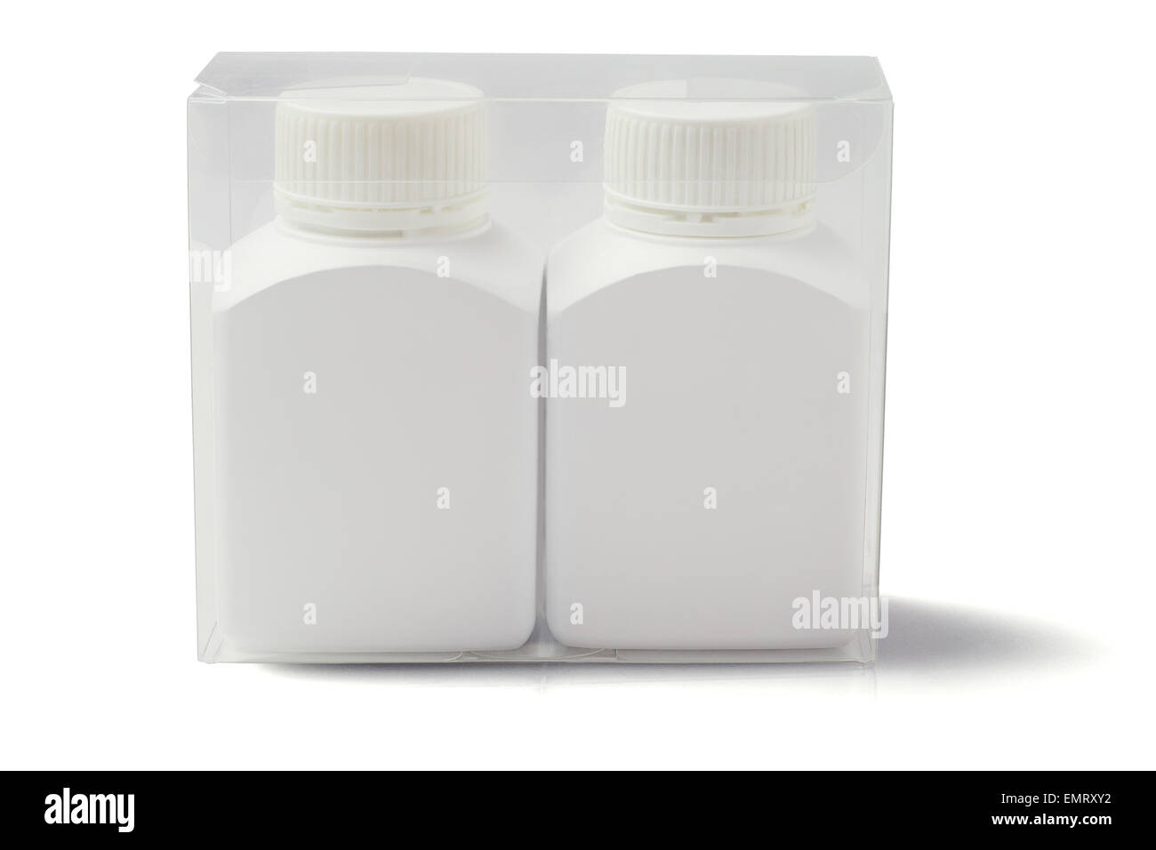 Pack of Two Medicine Bottles in Transparent Plastic Box on White Background Stock Photo