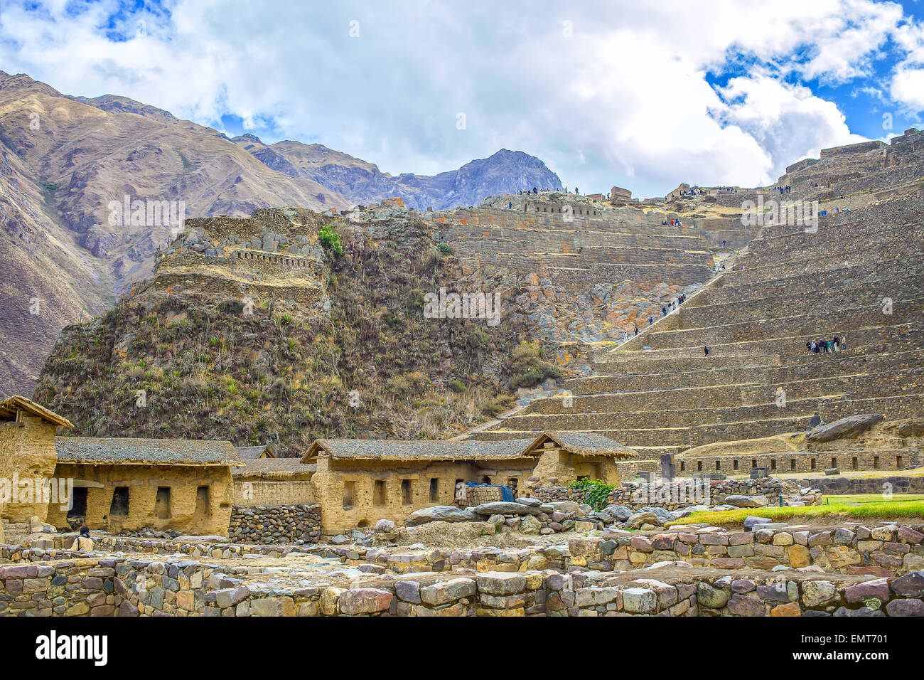 Ruins of Incan hillside fortress at the town of Ollantaytambo in Peru Stock Photo