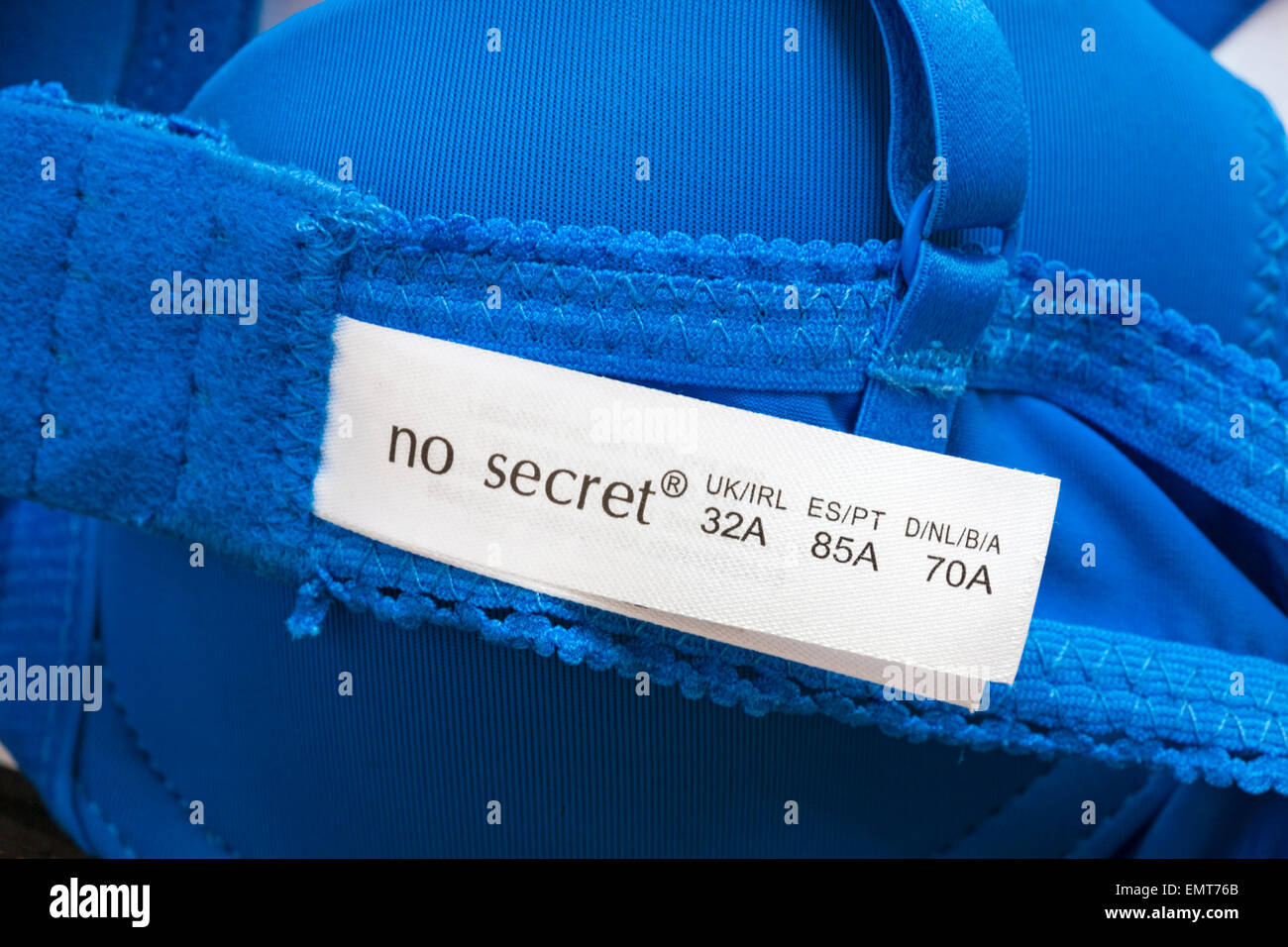 Label in blue no secret bra size 32A Stock Photo - Alamy