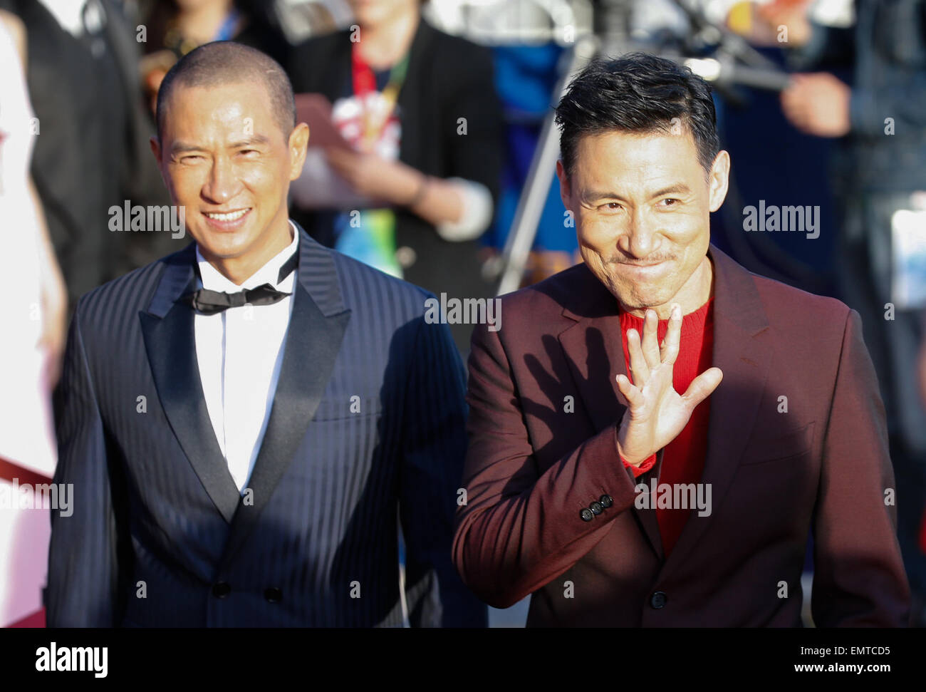 Beijing, China. 23rd Apr, 2015. Actors of the movie 'Helios' Nick Cheung (L) and Jacky Cheung walk the red carpet during the closing ceremony of the fifth Beijing International Film Festival (BJIFF) in Beijing, capital of China, April 23, 2015. The BJIFF closed here on Thursday. © Shen Bohan/Xinhua/Alamy Live News Stock Photo