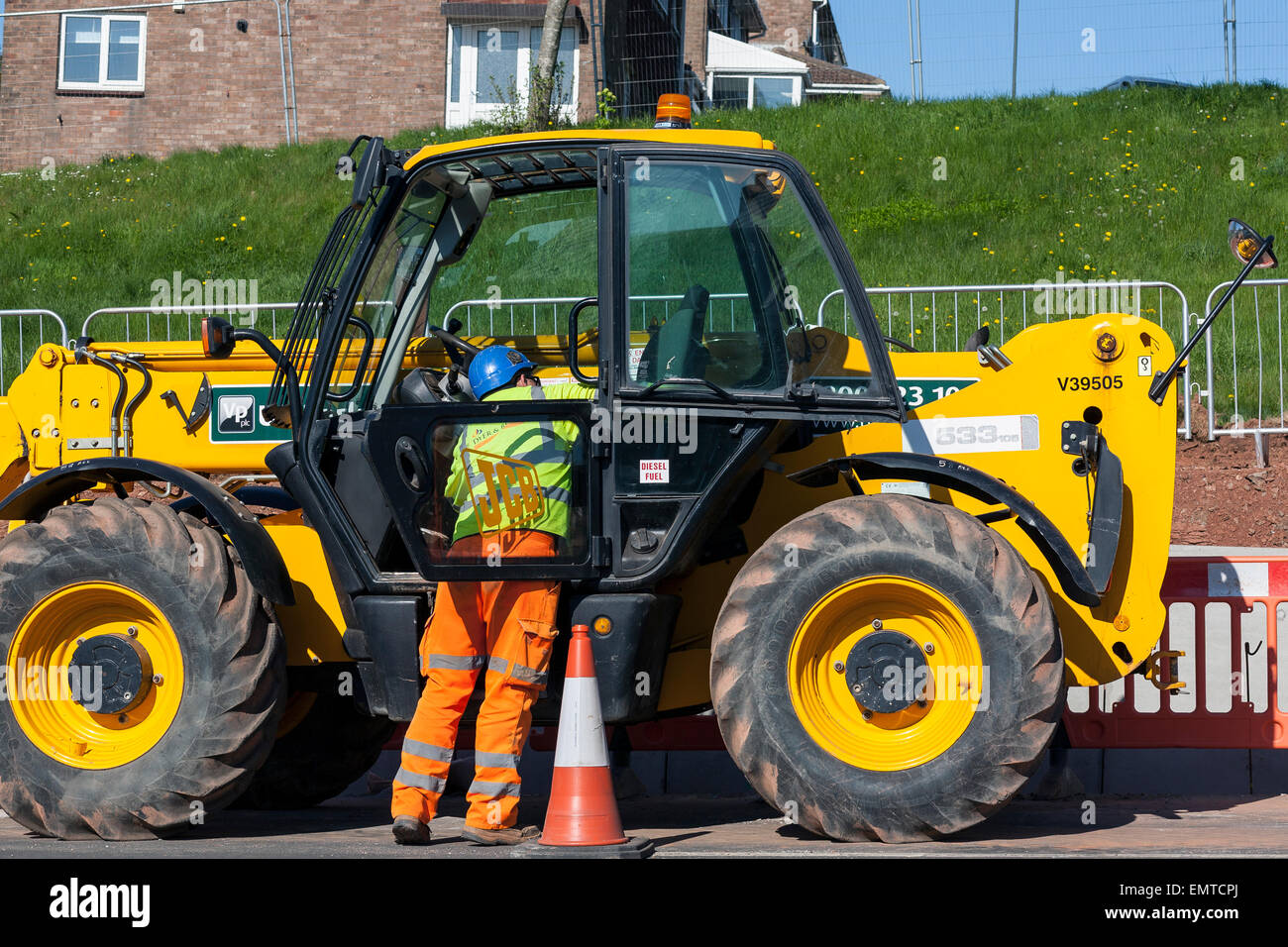 jcb driver,In every corner of the world you'll find a JCB machine. JCB is one of the world's top three manufacturers of construc Stock Photo