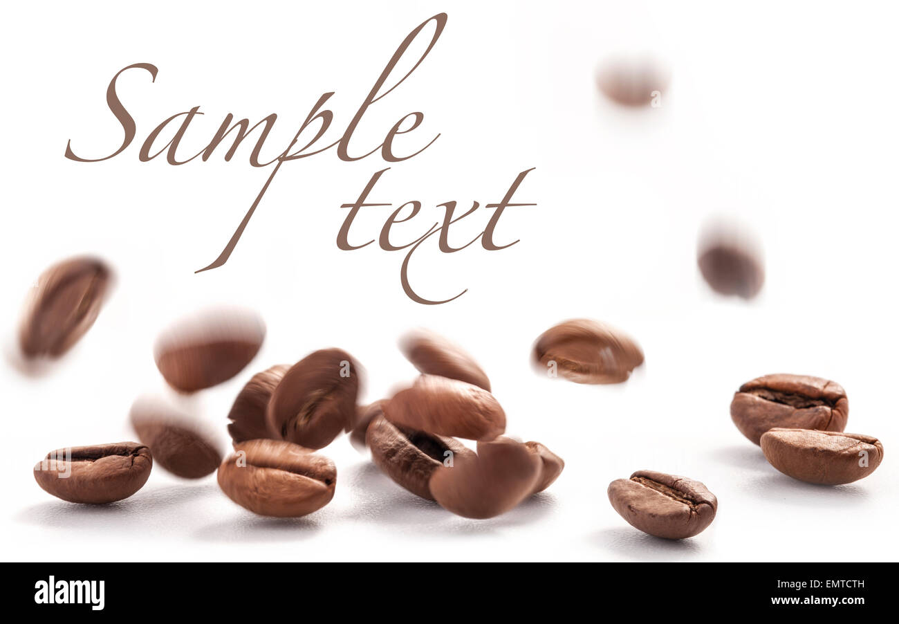 Flying coffee beans isolated on white background Stock Photo - Alamy
