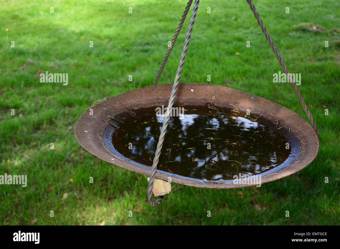 An imaginative water basin made of iron objects Stock Photo