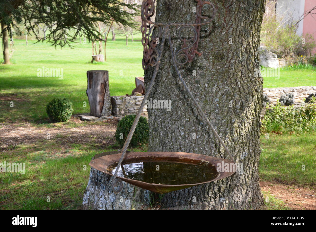 An imaginative water basin made of iron objects Stock Photo