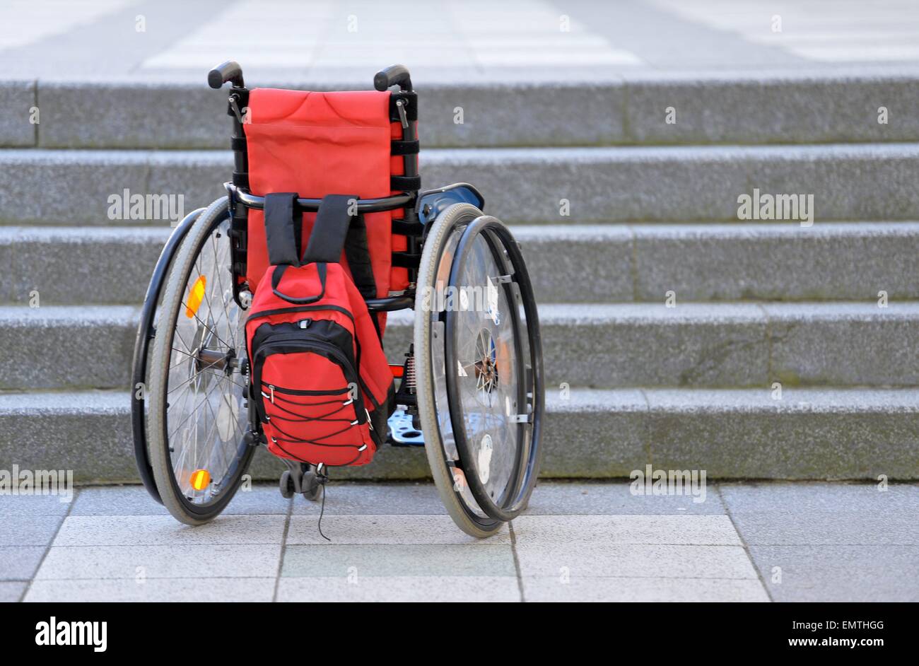 Wheelchair infront of steps./picture alliance Stock Photo