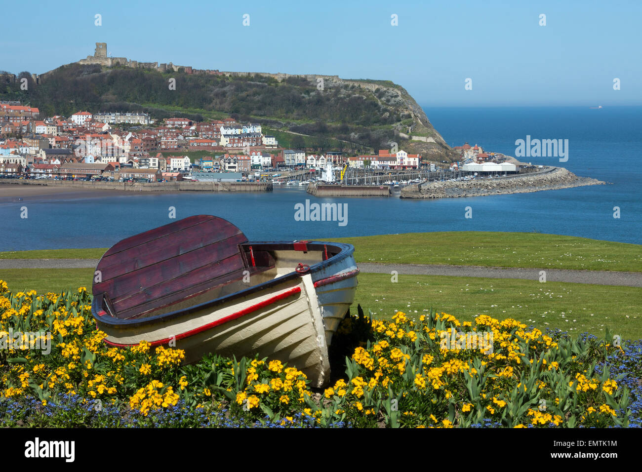 Scarborough Castle on a hillside above the town and harbor - North Yorkshire coast in the northeast of England. Stock Photo