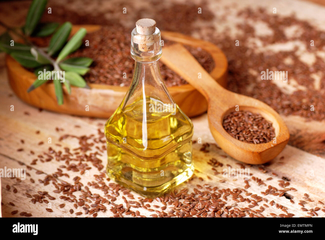 essential oil of linseed in the small glass bottle Stock Photo Alamy
