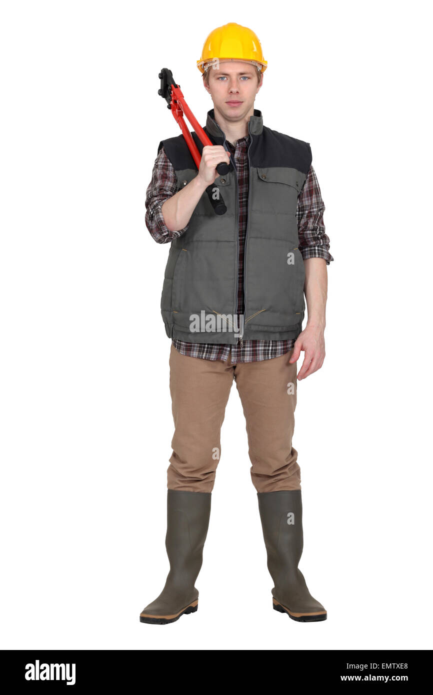 Laborer standing on white background Stock Photo - Alamy