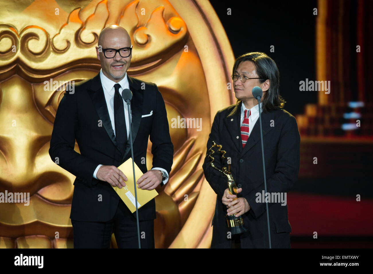 Beijing, China. 23rd Apr, 2015. Guests Peter Chan (R) and Fedor Bondarchuk attend the awarding ceremony of the Tiantan Award of the fifth Beijing International Film Festival (BJIFF) in Beijing, capital of China, April 23, 2015. © Chen Jianli/Xinhua/Alamy Live News Stock Photo
