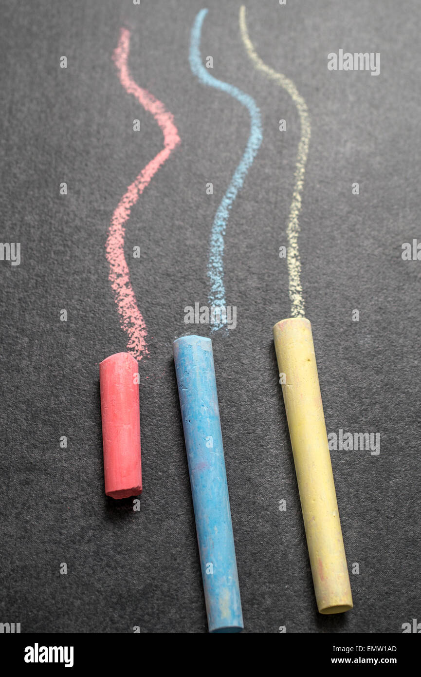 Colored chalk on a blackboard background,close up Stock Photo