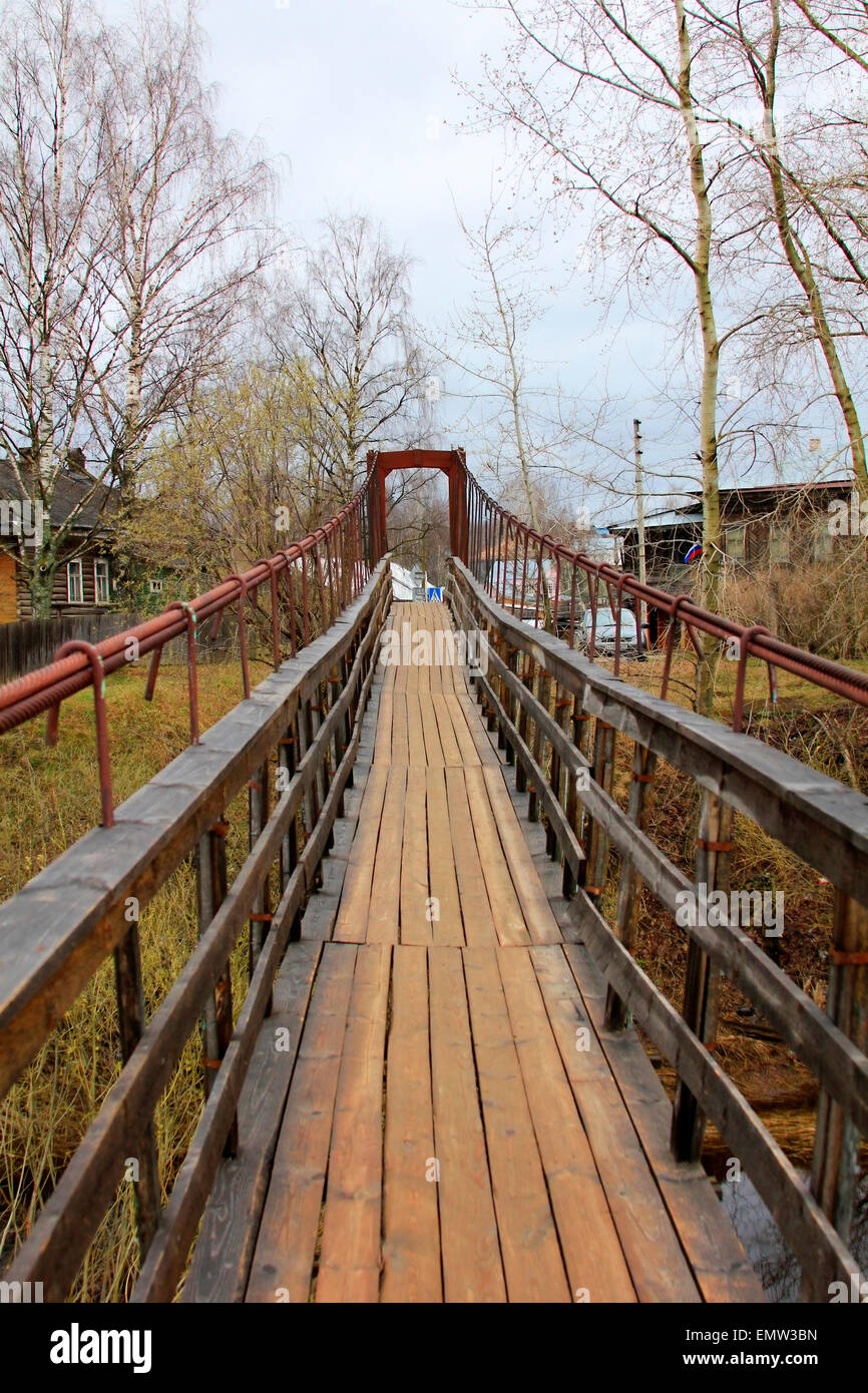 Suspension bridge across the Volga River in the village of Verkhovazhye ...