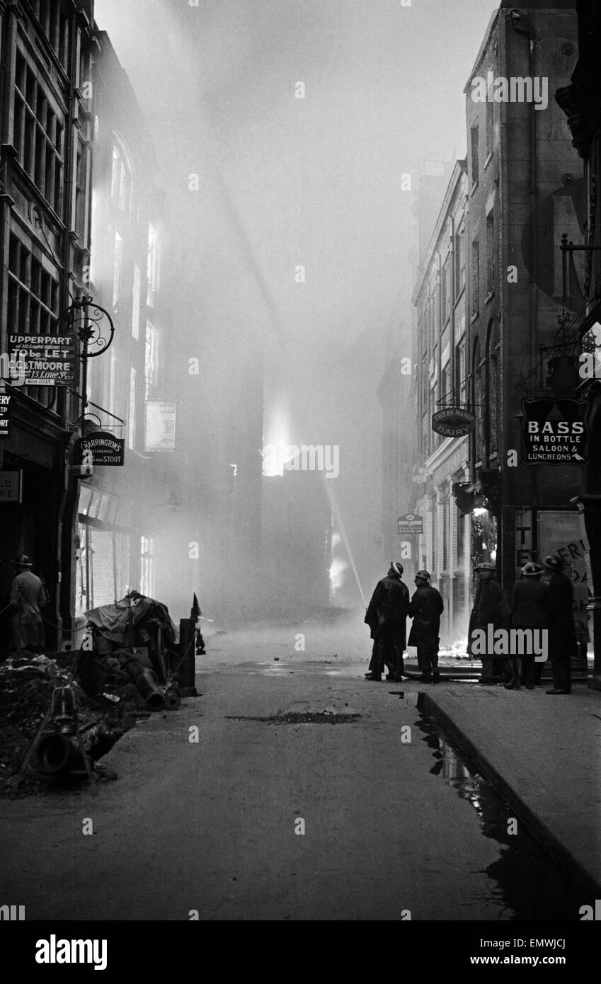 Fetter Lane ablaze during a night of Bombing. 10th May 1941. Stock Photo