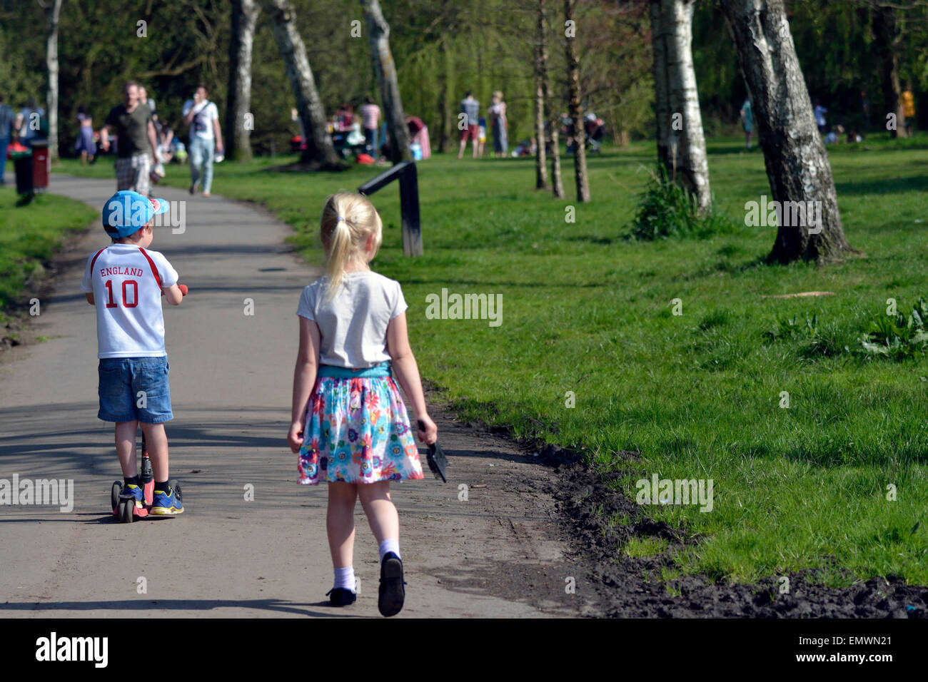 Manchester, UK. 23rd April, 2015. A young boy wearing an England shirt on St Day rides