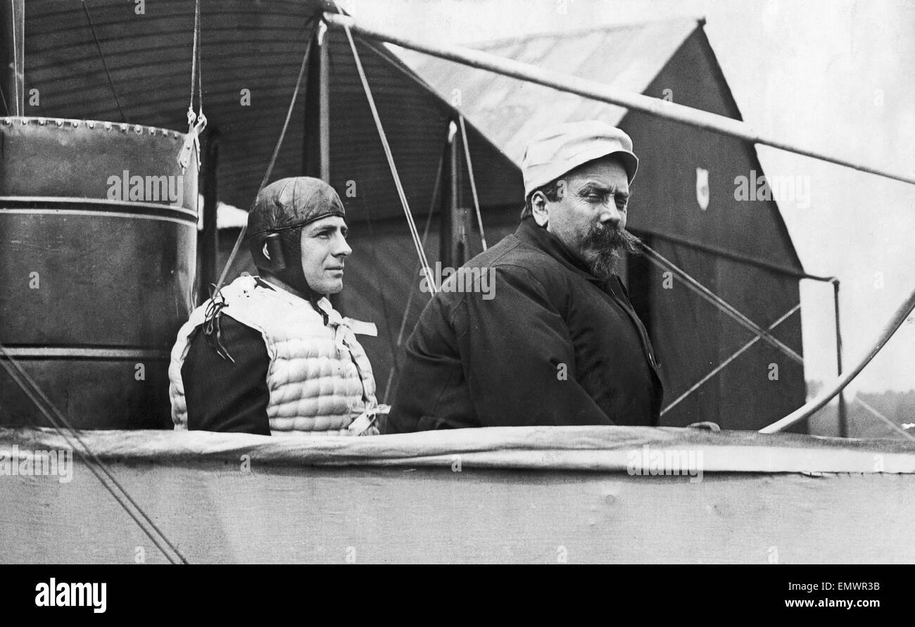 Samuel Franklin Cody seen here at the controls of his latest flying machine (Right) with his son Leon, shortly before Sam Cody was killed in a flying accident. 7th August 1913 Stock Photo