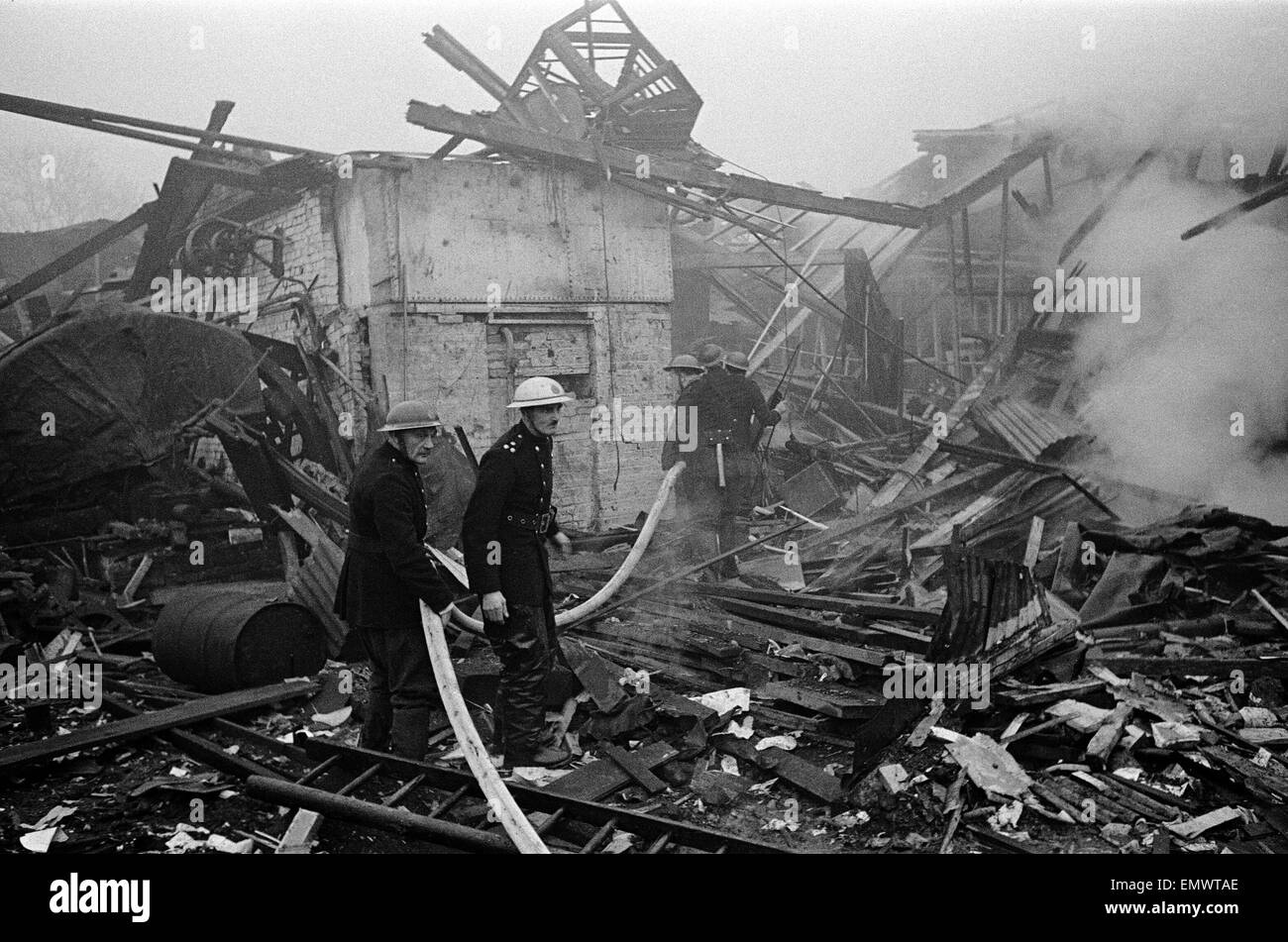 V2 Rocket incident at Brush Factory, High St, Waltham Cross. N.F.S at work amongst the rubble. 2nd January 1945 Stock Photo