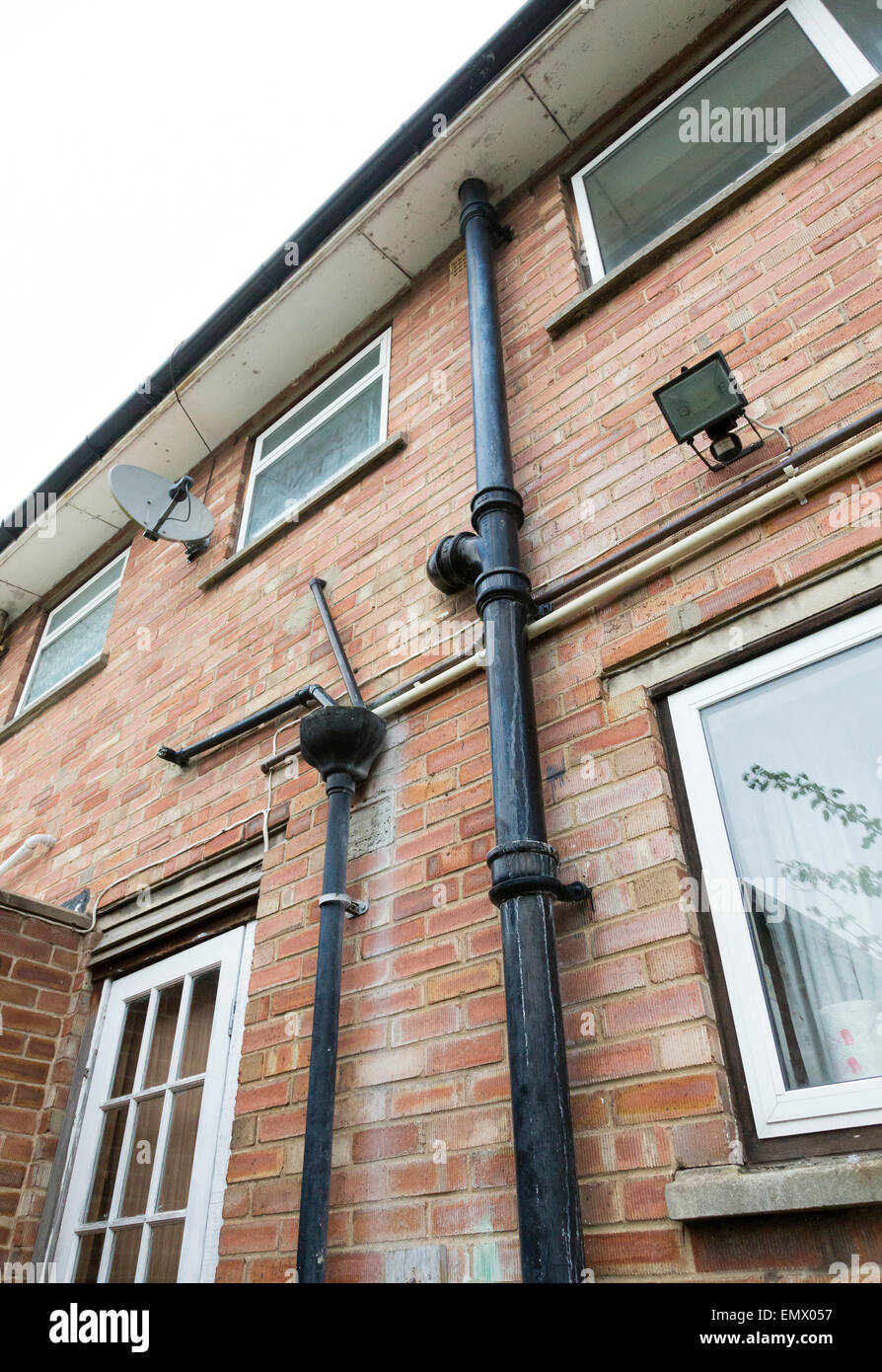 cast iron drain pipes on a 1950's house in the UK Stock Photo