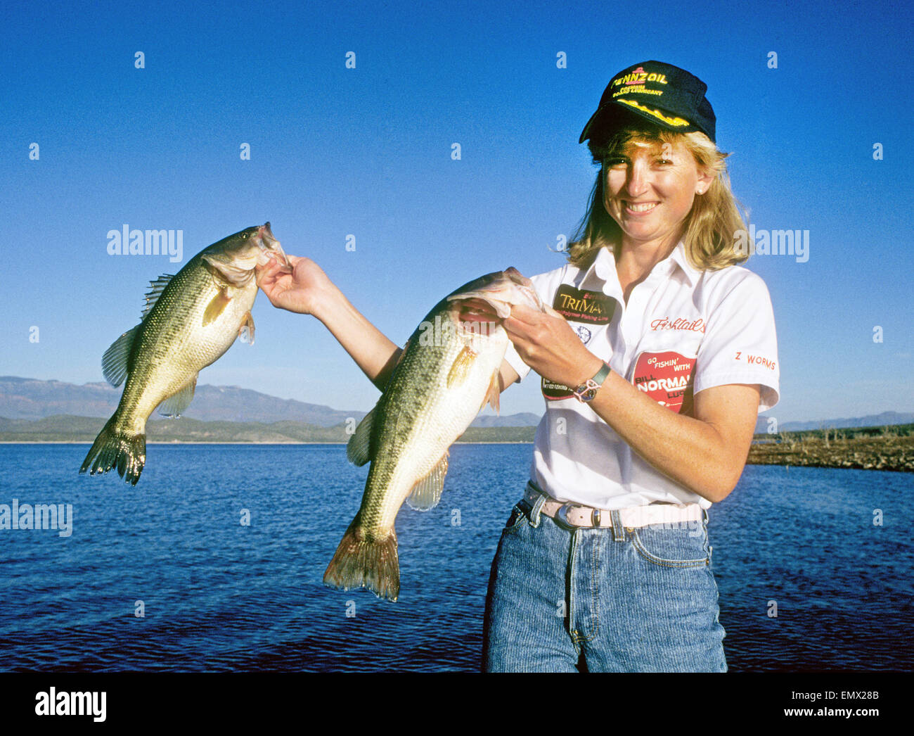 A woman bass fisherman with largemouth bass on Elephant Butte Lake