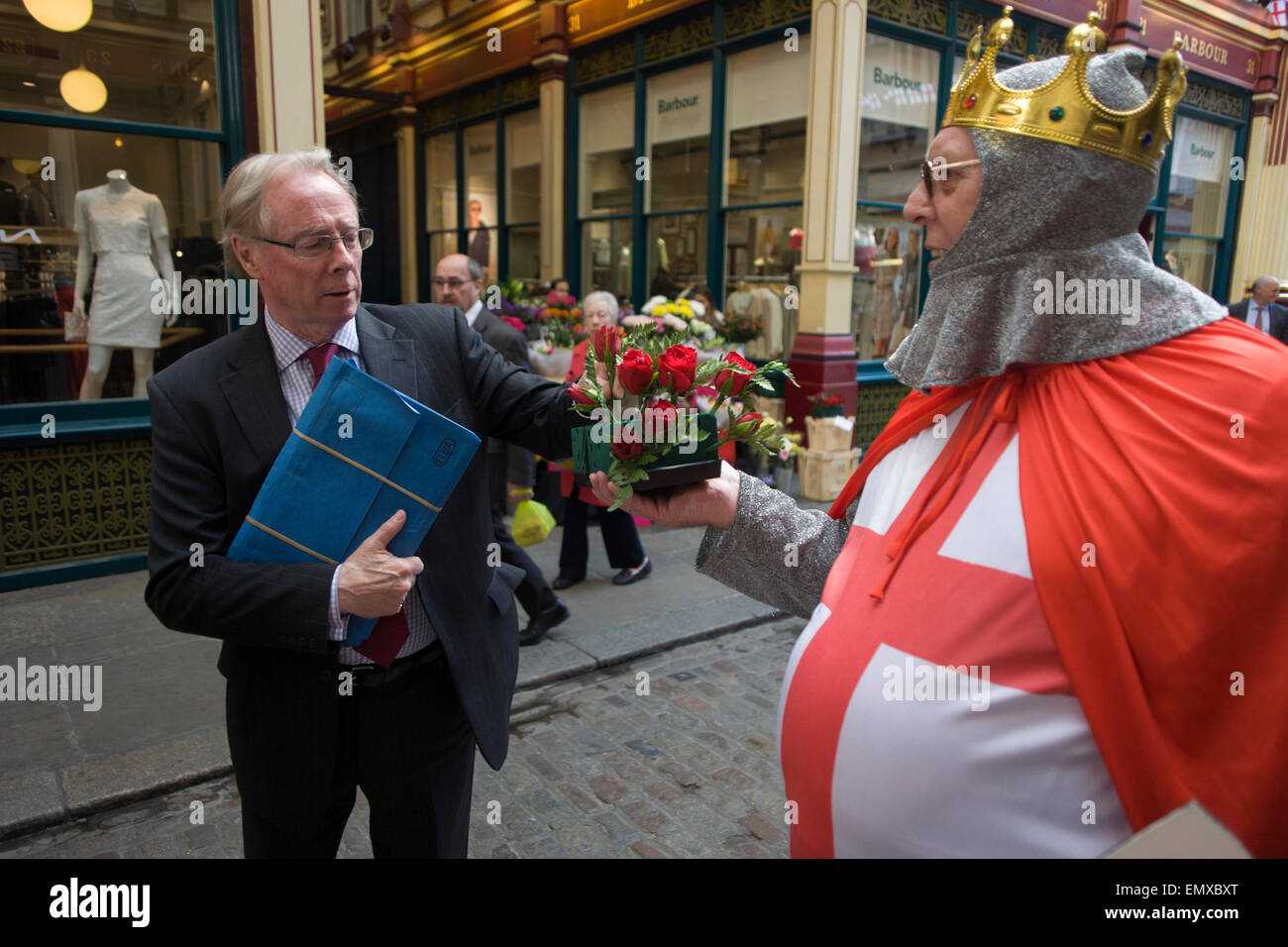 St George in full regalia hands out free red roses to Londoners in ...