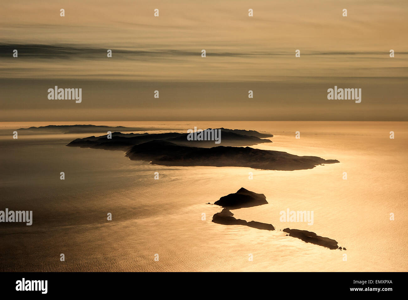 An aerial view of California's Channel Islands National Park in the golden light of a hazy afternoon Stock Photo
