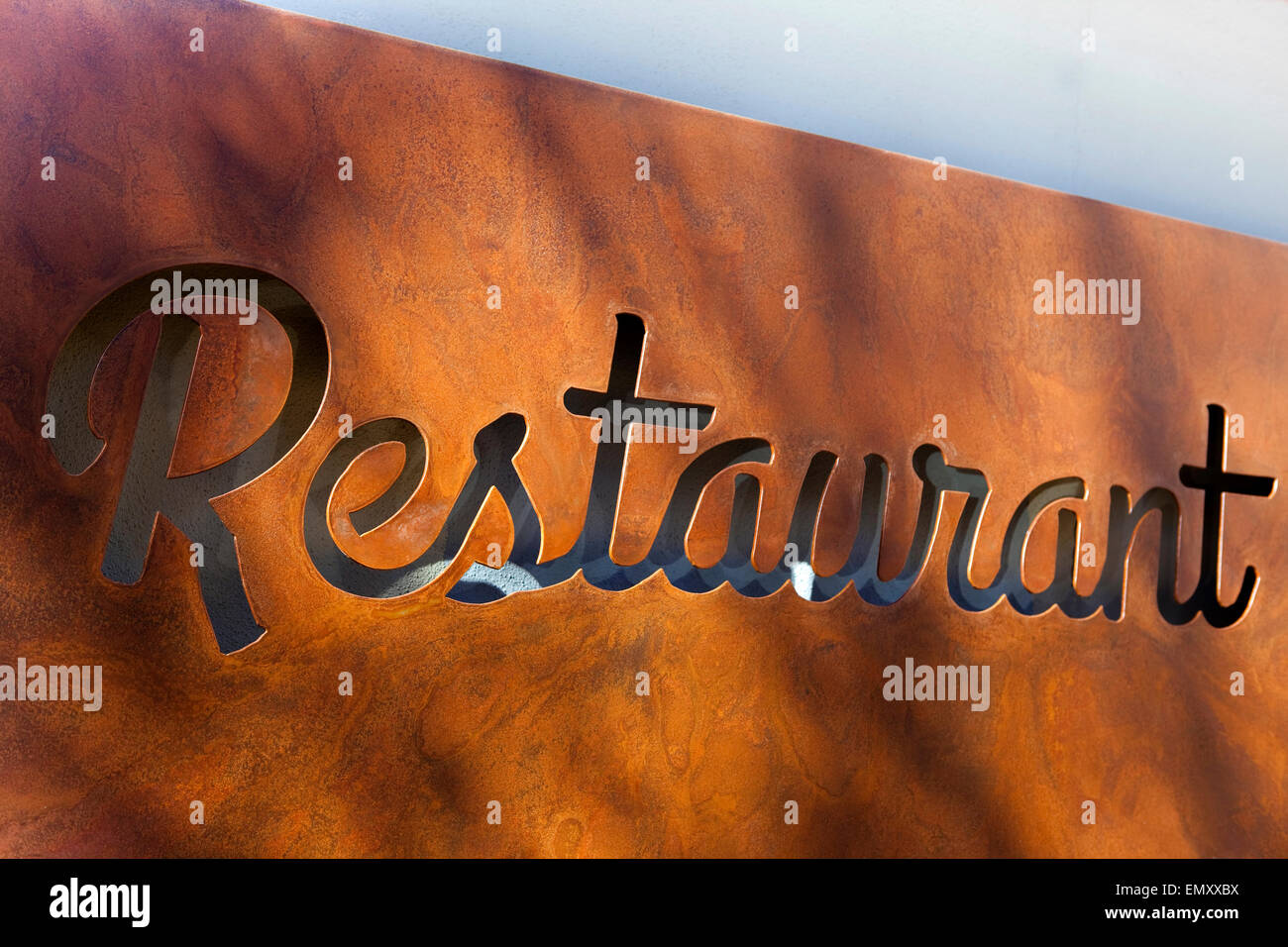 Rusty sign in the facade of a restaurant Stock Photo - Alamy