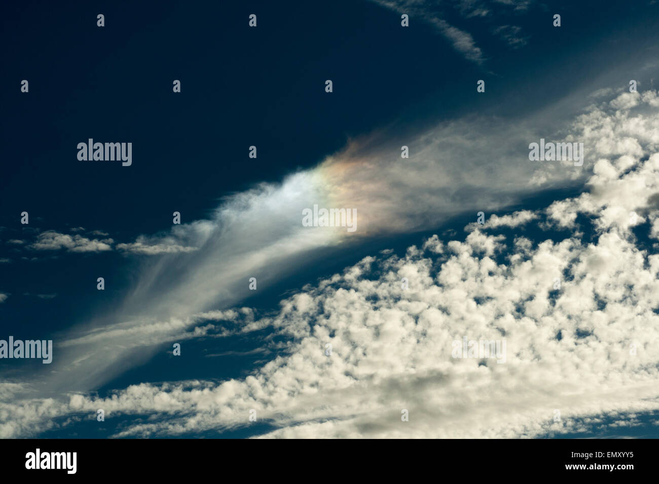 Rainbow effect in clouds Stock Photo Alamy